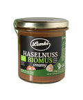 Lemke Haselnuss Biomus creamy 300 g Glas mit Produktetikett auf weißem Hintergrund