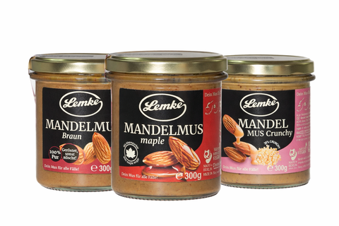 Lemke Mandelmus bundle with three almond butter jars, Braun, Maple and Crunchy, on a white background
