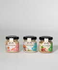 Lemke mini Stadtstreicher set with Mandel, Crunchy Cocos and Haselnuss spread jars on a white background