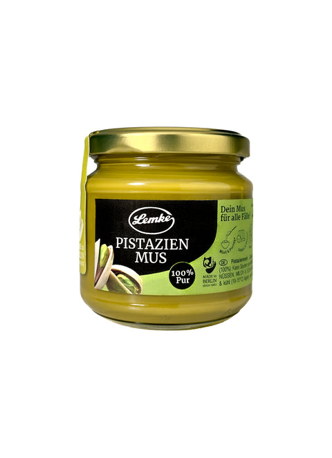 Lemke Pistazien Mus 180g jar, 100% pure pistachio butter spread on white background