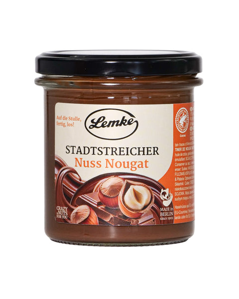 Lemke Stadtstreicher Nuss Nougatcreme 325g jar with hazelnut chocolate spread on a white background