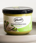 Lemke Stadtstreicher Pistazie spread jar 250g on a white plate background