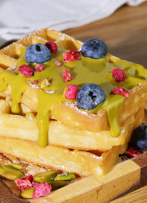 Fresh waffles with Lemke pistachio butter, blueberries, pistachios and raspberry pieces